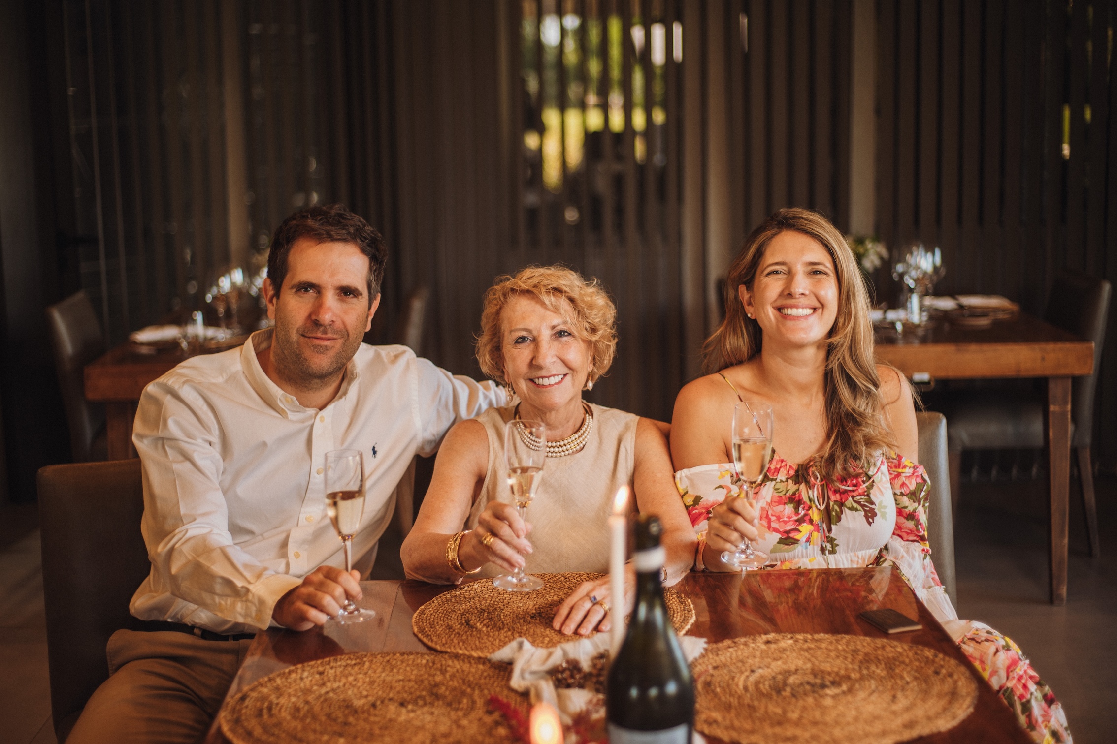 A winemaking family gathered over a glass of wine: José Lovaglio with his mother, Susana Balbo, and his sister, Ana Lovaglio.