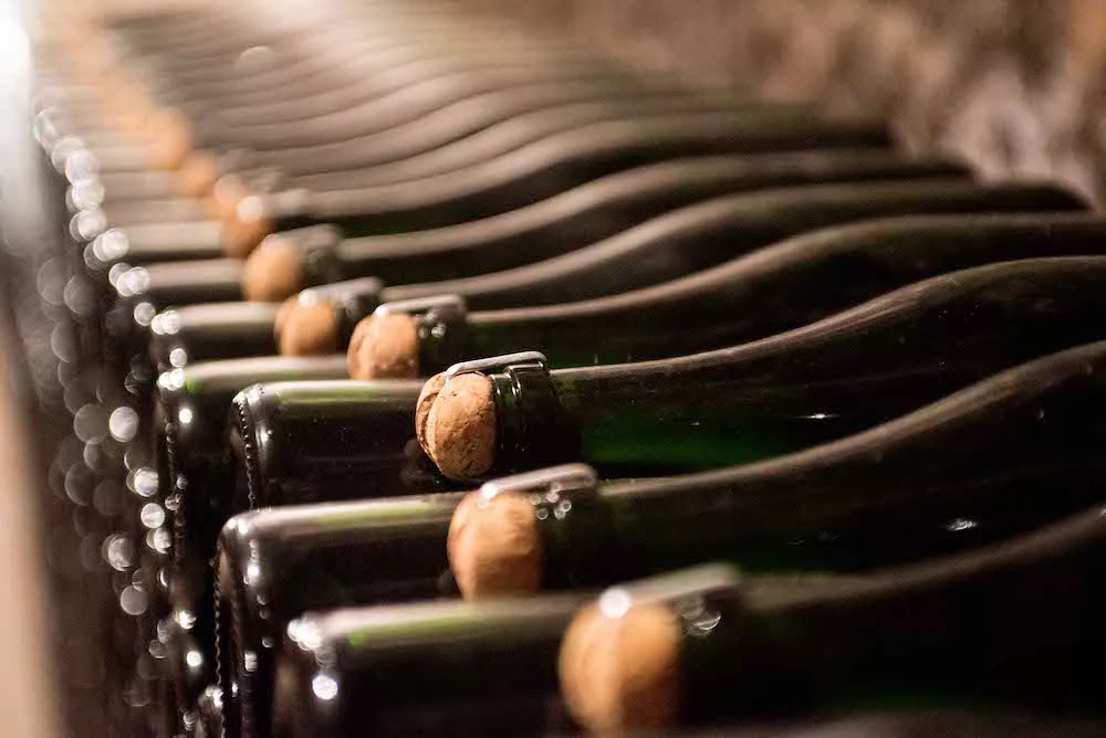Bottles with staples and cork in the cellars at Domaine Franck Bonville
