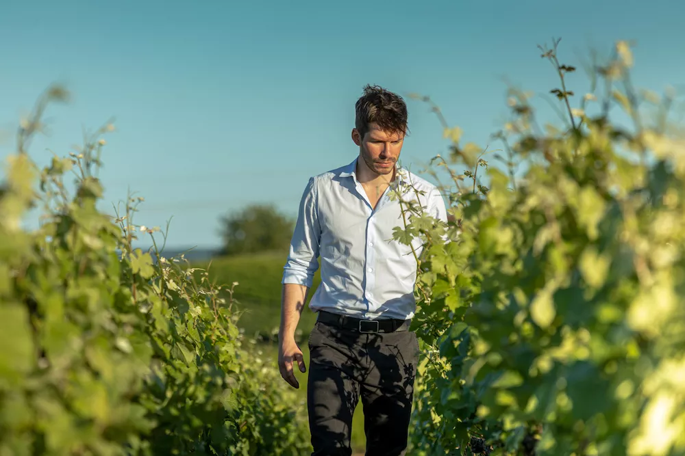 Thomas Lombard in his vineyard