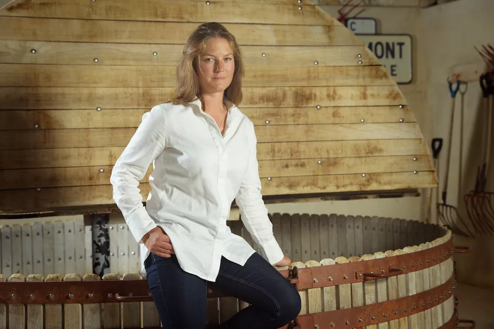 Laurianne Lejour in front of the grape press