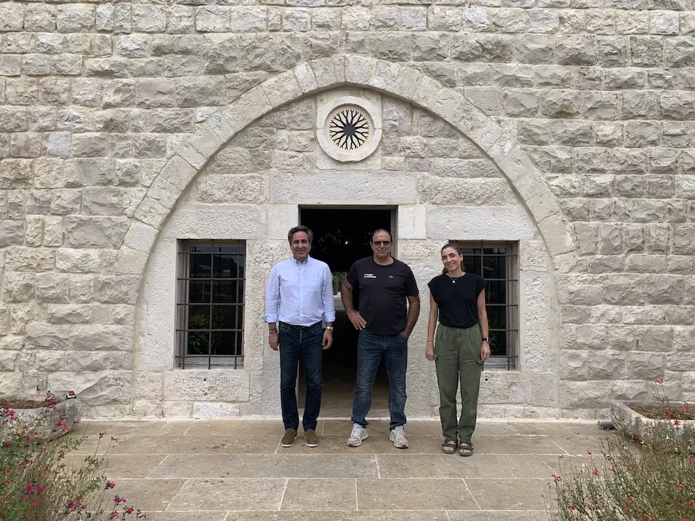 Gabriel Rivero, winemaker, Aurelie Thoros, marketing manager, and general manager Talal Madi, in front of IXSIR winery’s entrance.